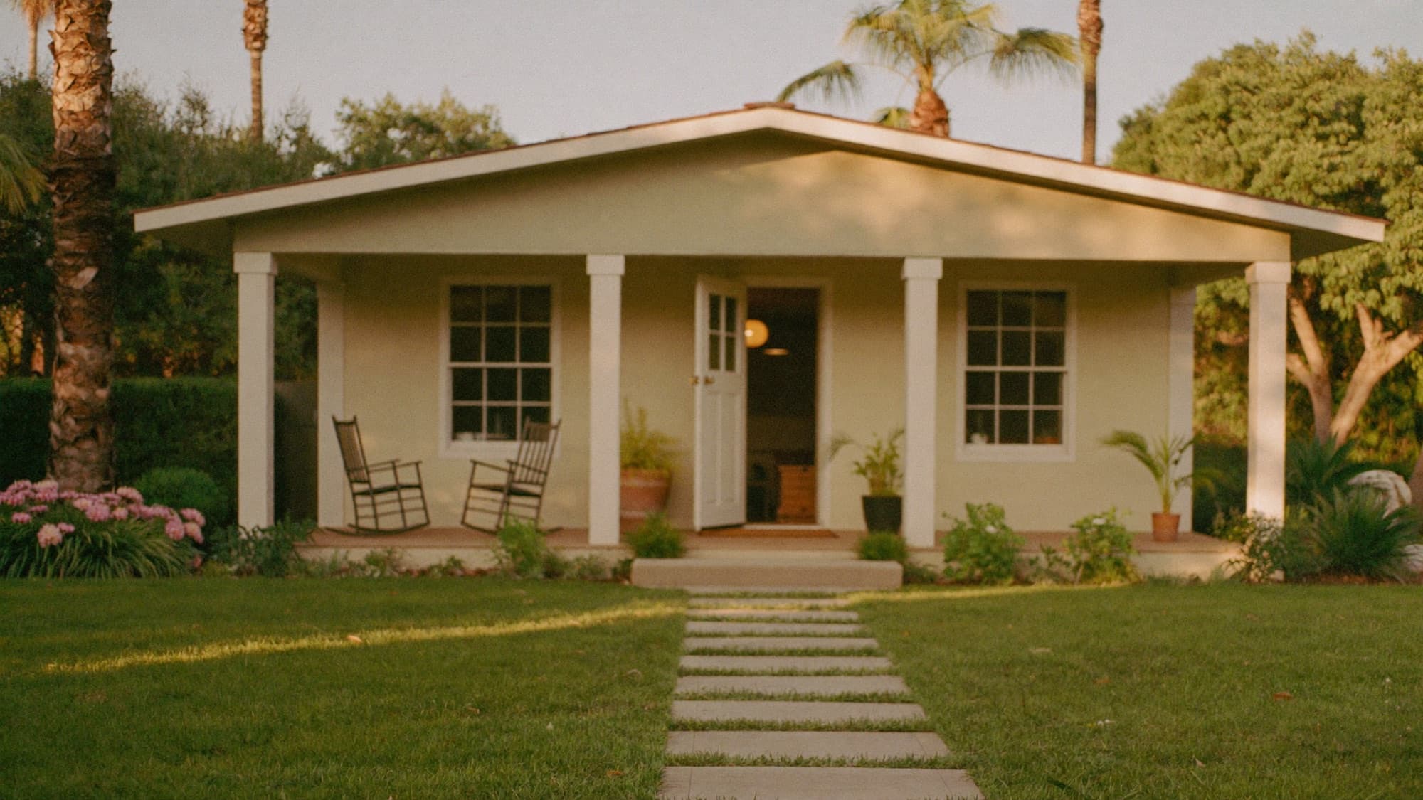 The Valrico Family Care Home exterior at golden hour, with a welcoming front porch and garden path